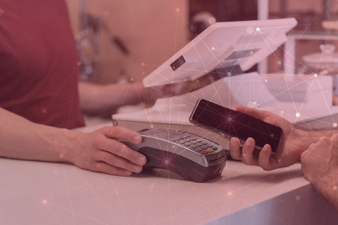 A contactless payment at the point of sale, overlaid with a connected data network.